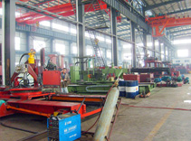 Rail bound forging charging manipulator assembly